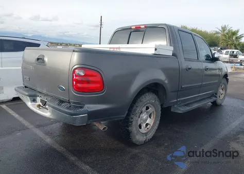 2002 Ford F-150 Lariat/Xlt z USA, uszkodzony, nr VIN 1FTRW07L92KE41395